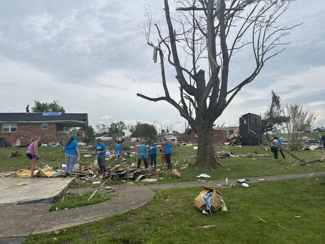 Volunteers pick home storm damage - May 19.jpeg