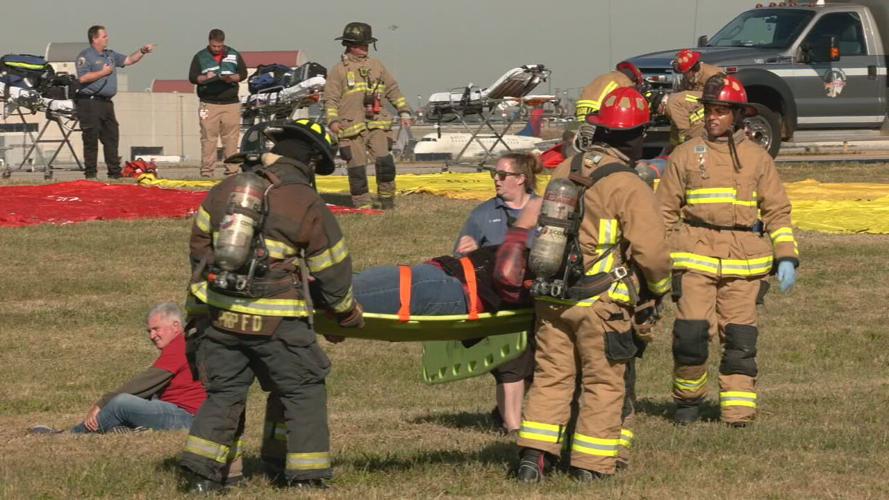 EMS workers take part in a training exercise at Louisville Muhammad Ali International Airport