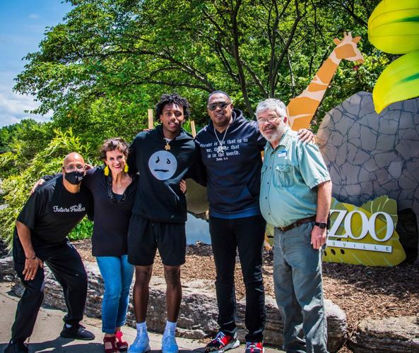 Master P with staff.jpg