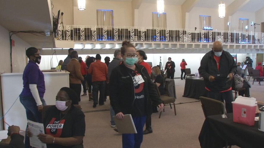 Louisville church administering vaccine shots.