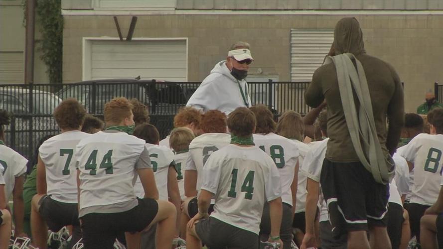 Trinity football coach  Bob Beatty addresses his team