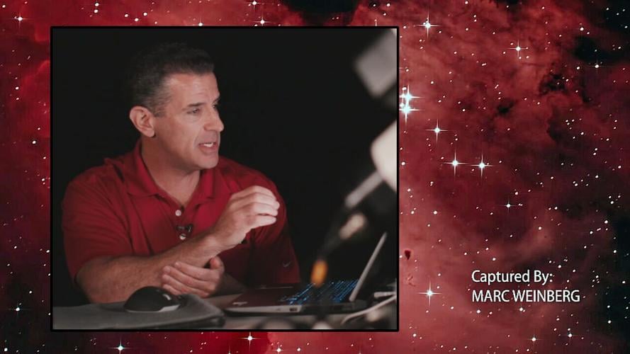 Marc Weinberg with telescope over image of Eagle Nebula