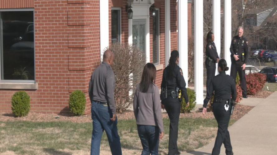 Mourners enter Fern Creek Baptist Church for Michael Wehdah visitation