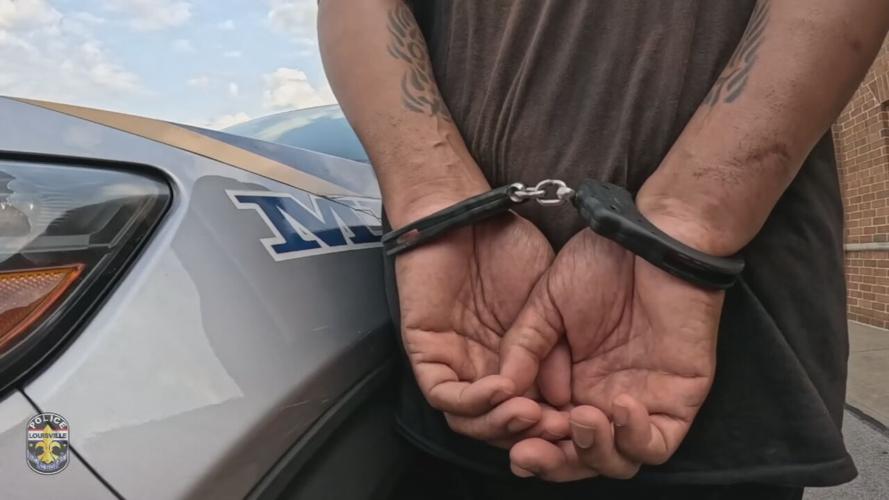 LMPD 2025 SHOPLIFTING BLITZ -6-5-2025 (4). - Hands in handcuffs - good file image