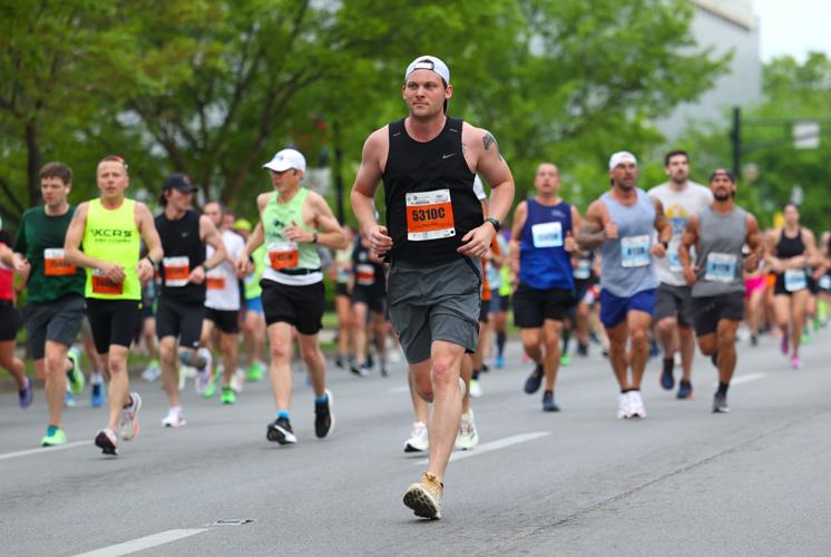 Marathon runners on Broadway.JPG