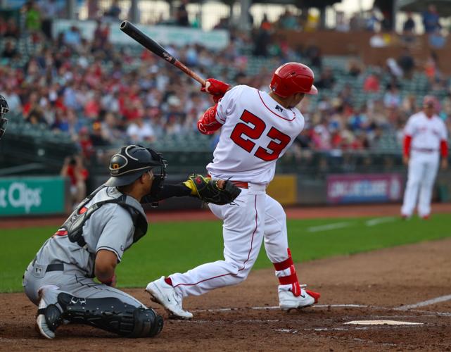 Nick Senzel hits the ball.JPG