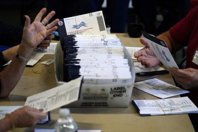 Chester County election workers process mail-in ballots.jpeg