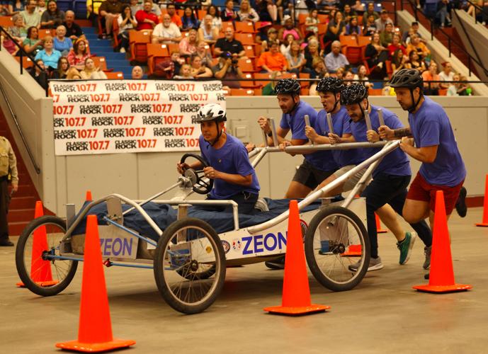 Team goes down stretch in bed races.JPG