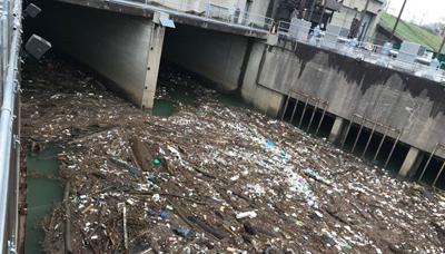 Flooding debris forming 'Trash Island' near the Beargrass Flood Pump Station