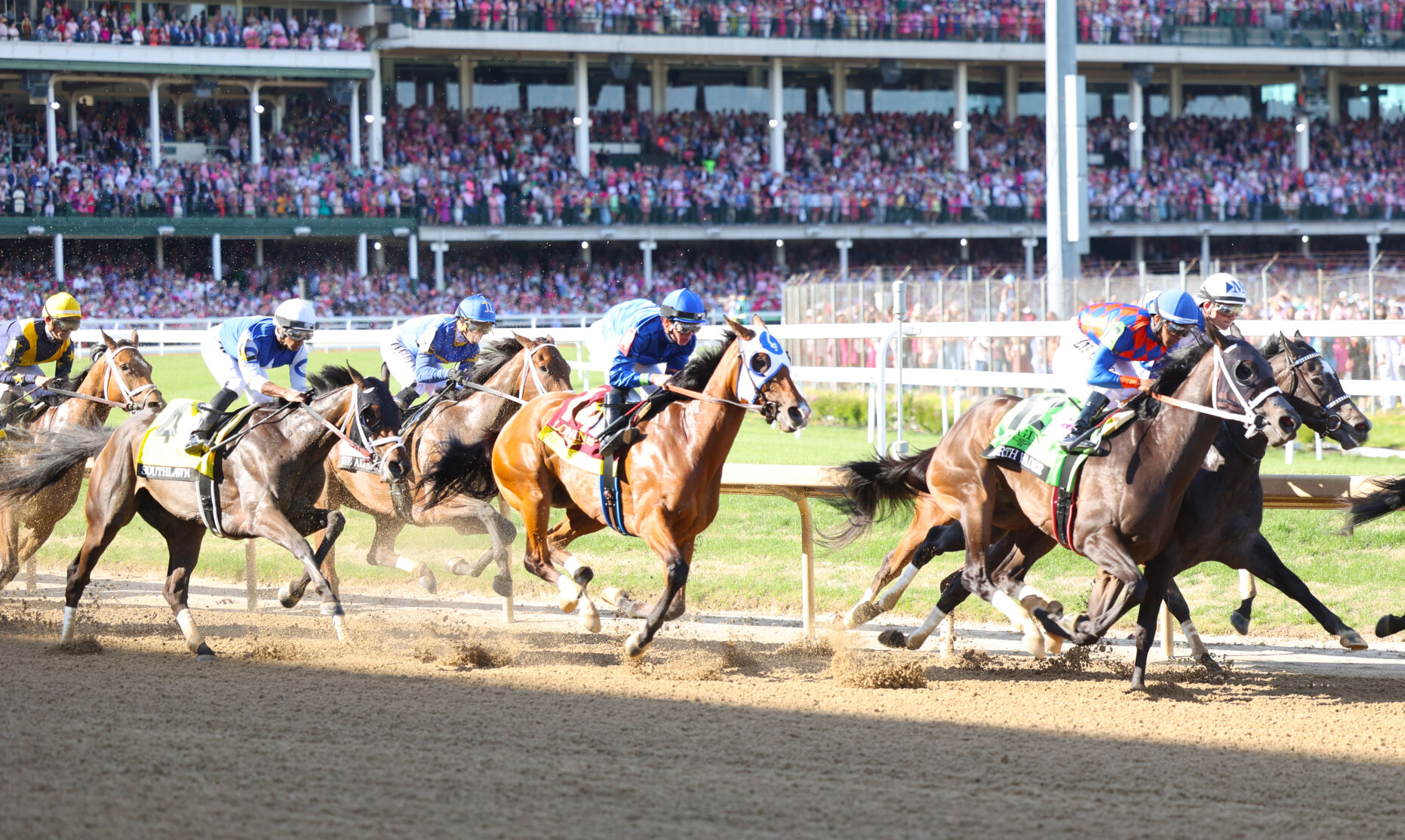 Horses run at Oaks race at Churchill Downs.JPG