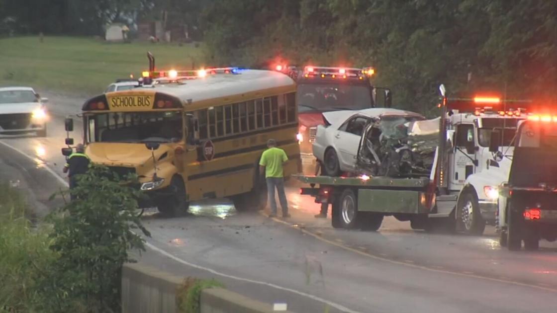 1 motorist killed, 9 students injured after car hits school bus in
