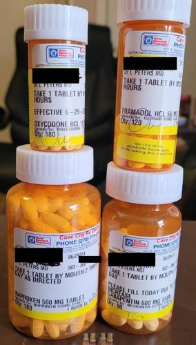 PAIN DOCTOR - LAWRENCE PETERS - PILL BOTTLES (REDACTED).jpg