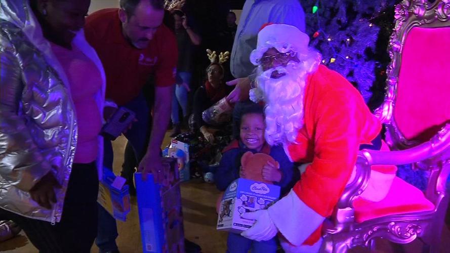 Santa visits hundreds of children at community event in Park Hill neighborhood