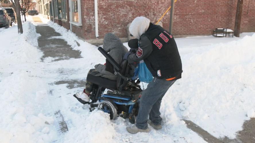 Neighbors help clear Louisville sidewalks 1-26-26