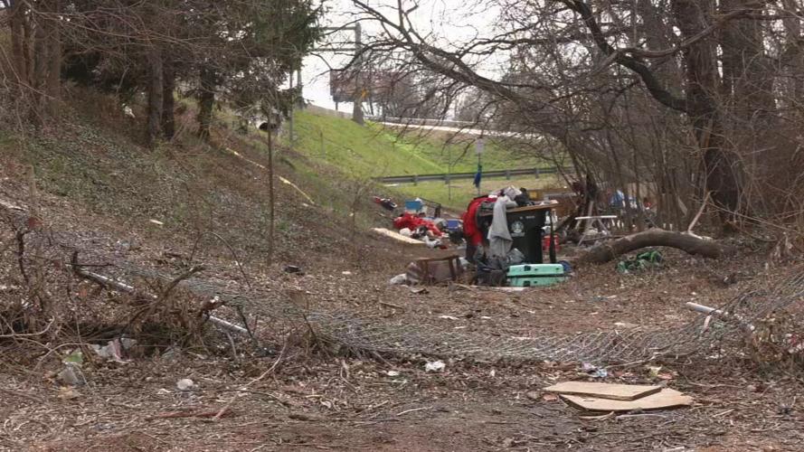 Homeless camp off I-65 ramp near Woodbine Street in Old Louisville