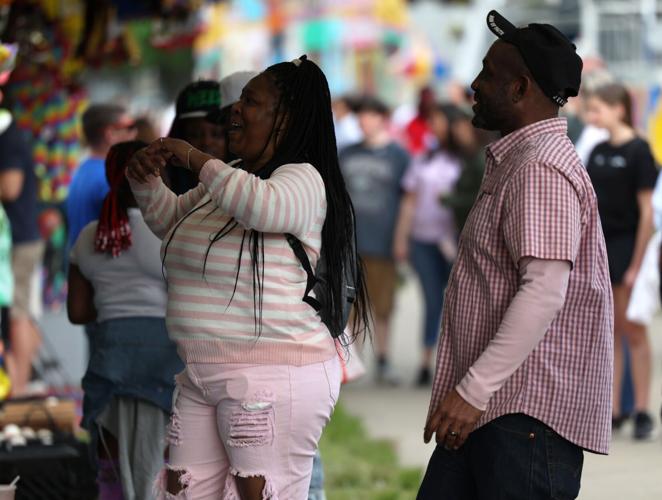 Two people play a game at the Chow Wagon