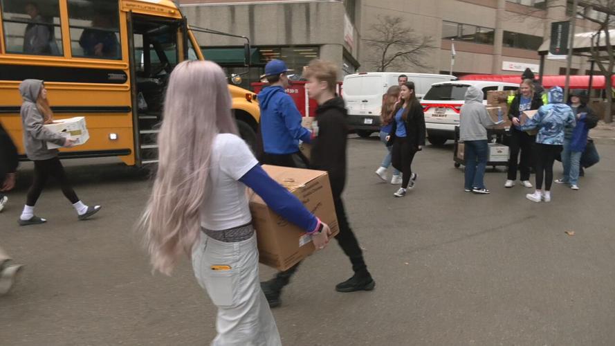 Hardin middle schoolers unload donations for cancer patients