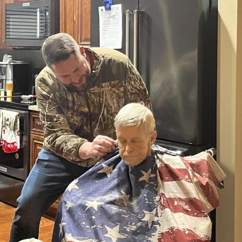 Bruce Gooden cuts hair of terminally ill veteran