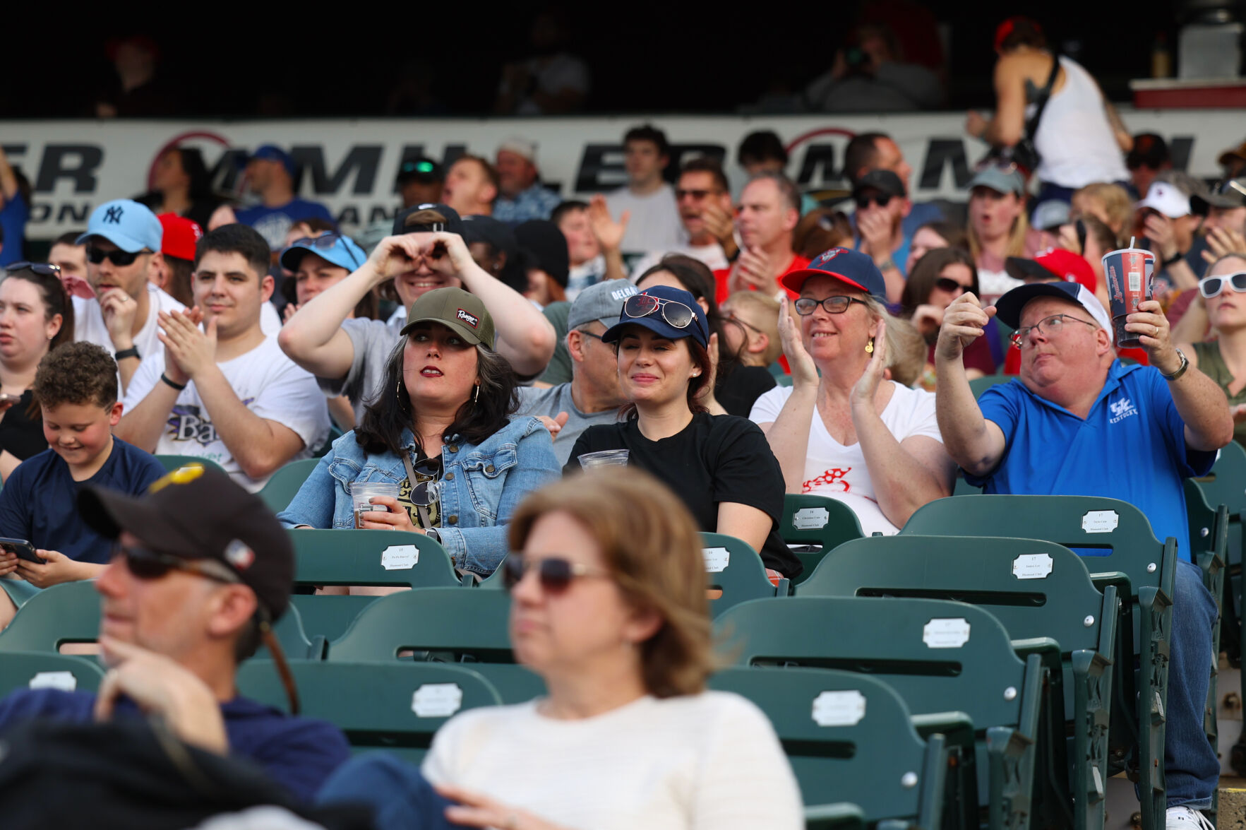 Bats fans cheer for team.JPG
