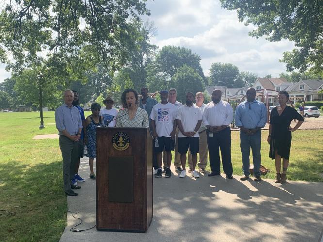 Leila George of Olmsted Parks Conservatory speaks at ribbon cutting at Victory Park
