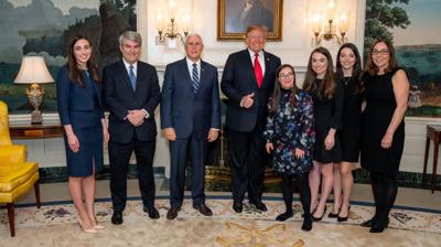 President Trump visits with Down Syndrome families