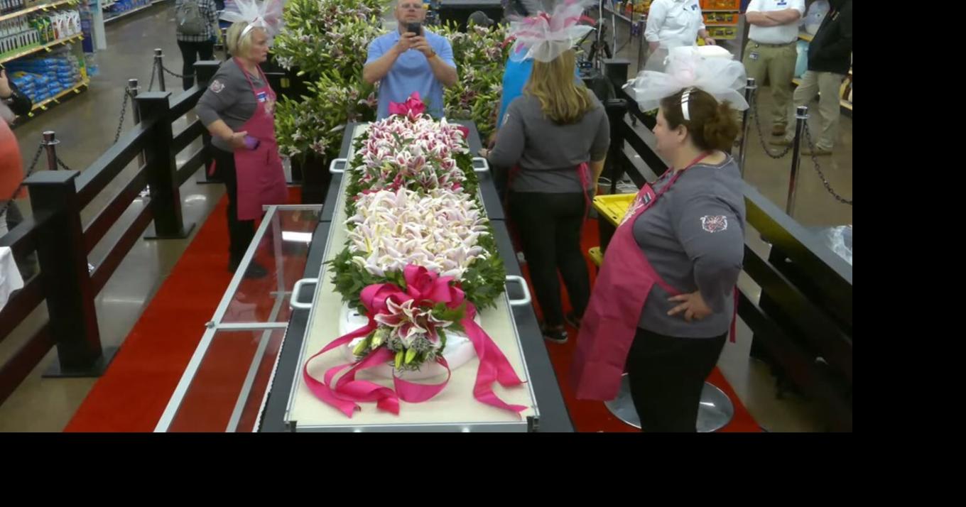 Kroger workers, volunteers finish Garland of Lilies for Friday's