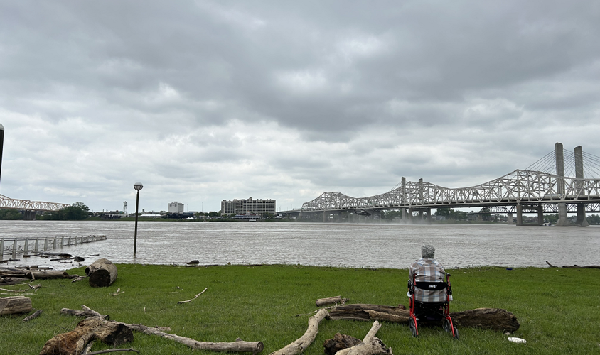 People watch air show practice at Louisville water front
