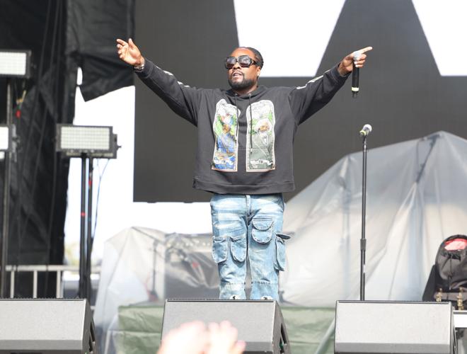 Wale walks onto stage at Forecastle.JPG