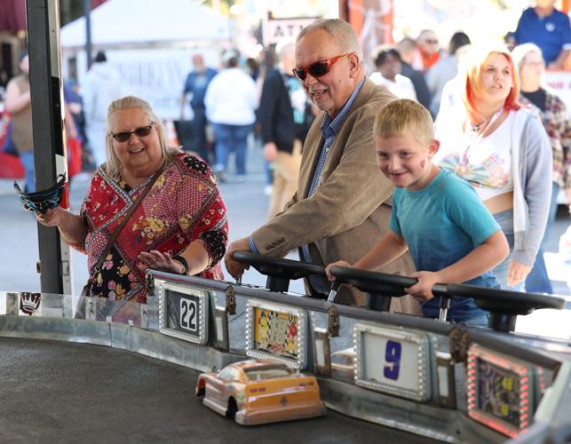 Harvest Homecoming - races with cars.JPG
