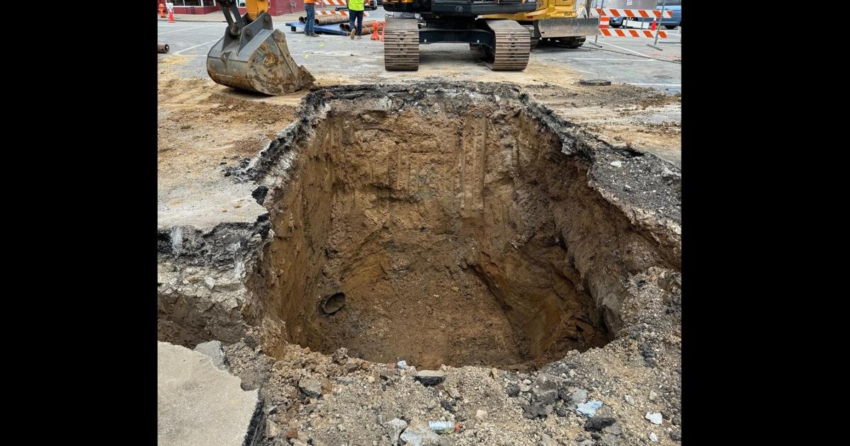 Sewer collapse opens large hole in street near downtown Louisville ...