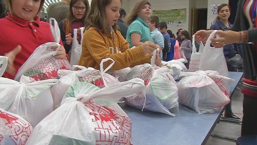 BLESSINGS IN A BACKPACK 11VO.transfer_frame_1647 Kids and bags.jpg