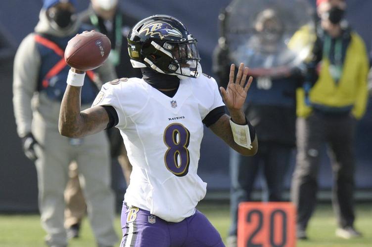 Baltimore Ravens quarterback Lamar Jackson (8) passes