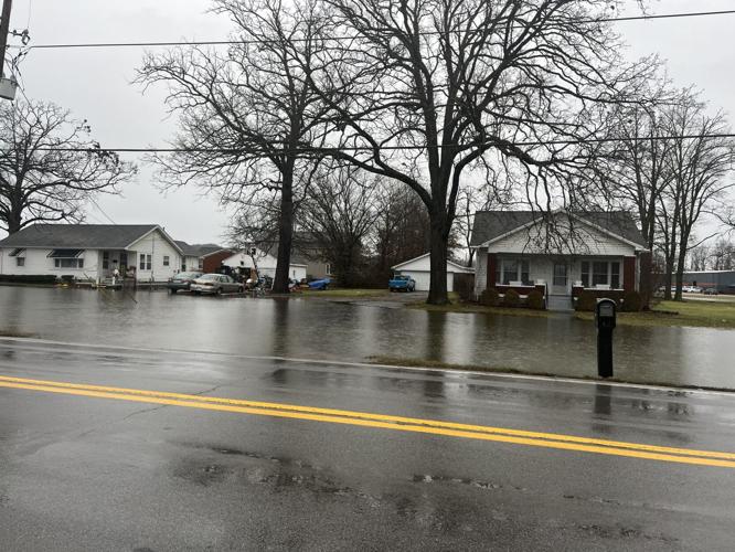 Front yards flooded at homes near Highway 44 in Bullitt County on Jan. 3, 2023
