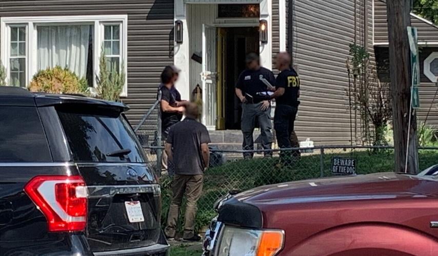 FBI representatives conduct investigation on Northwestern Parkway on Aug. 29, 2023