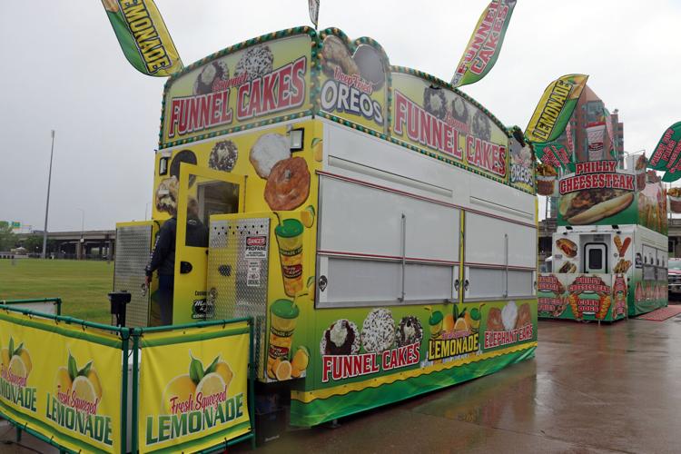 Crews set up booths along the Ohio River one day before Thunder Over Louisville 2023