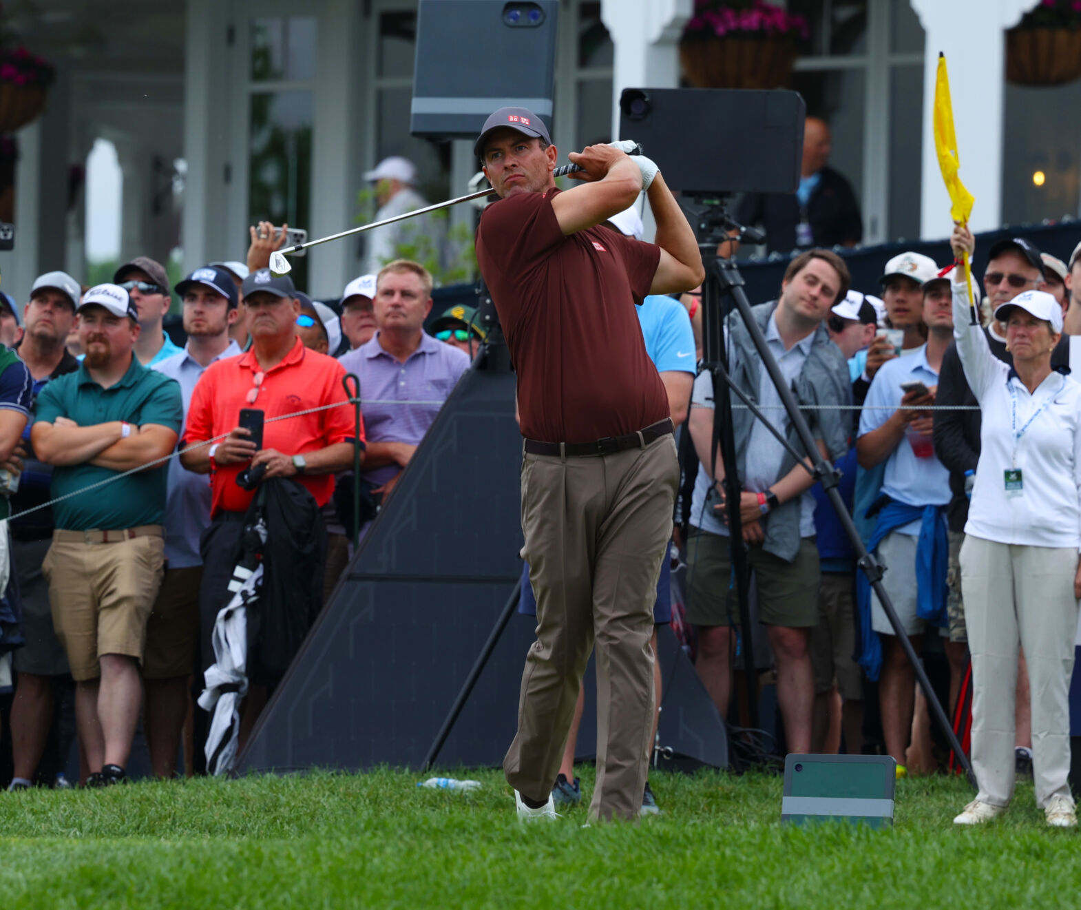 Adam Scott hits on the 13th tee box