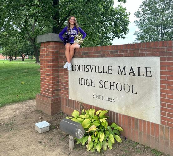 Addison Colvin at Male sign.JPEG