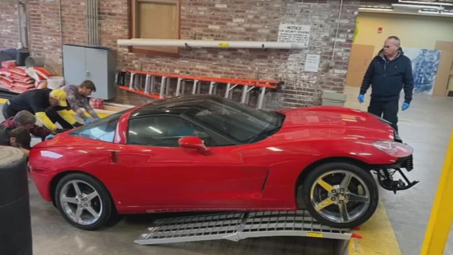 Crews prepare to move C6 corvette into Frazier Museum