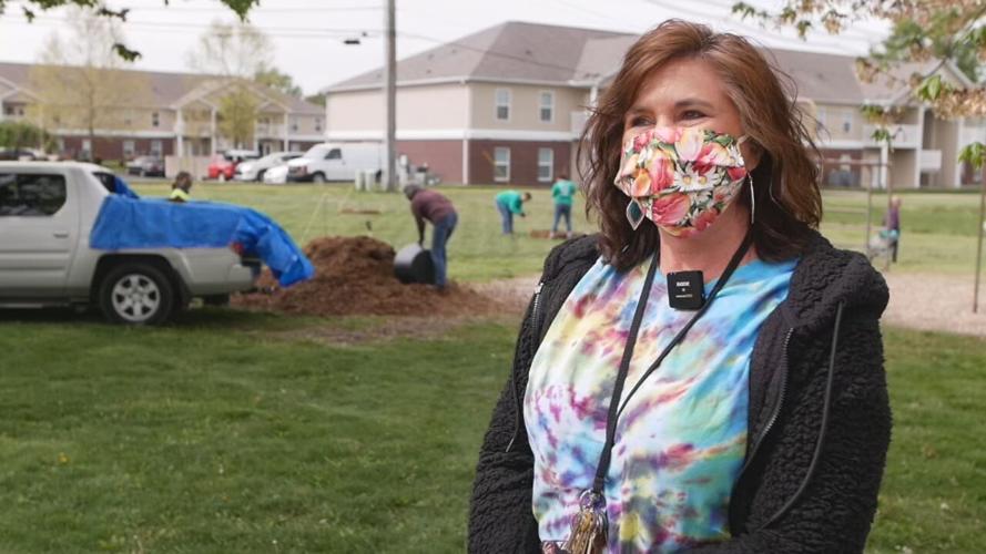 WDRB employees plant trees at Sanders Elementary School in effort to