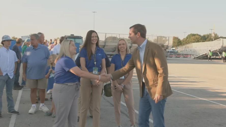Gov. Beshear shakes hands with people at Kentucky State Fair