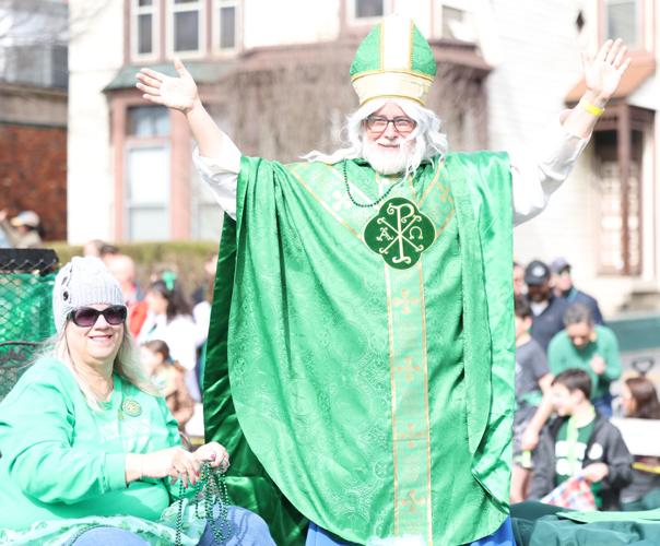 Man in priest outfit at parade