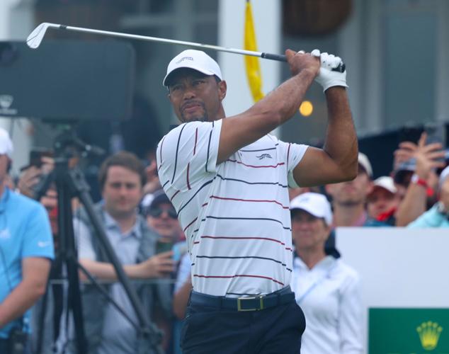Tiger Woods makes contact on 13th hole.JPG