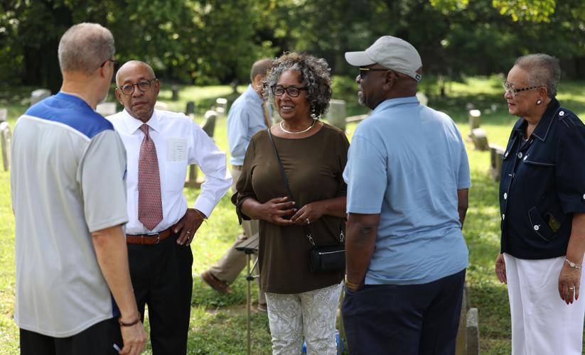 People talk at Eastern Cemetery before ceremony