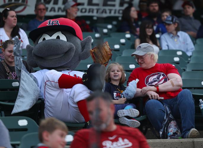 Buddy Bat sits with a young fan.JPG