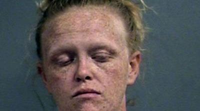 POLICE: Louisville mom arrested after child found crying alone outside apartment