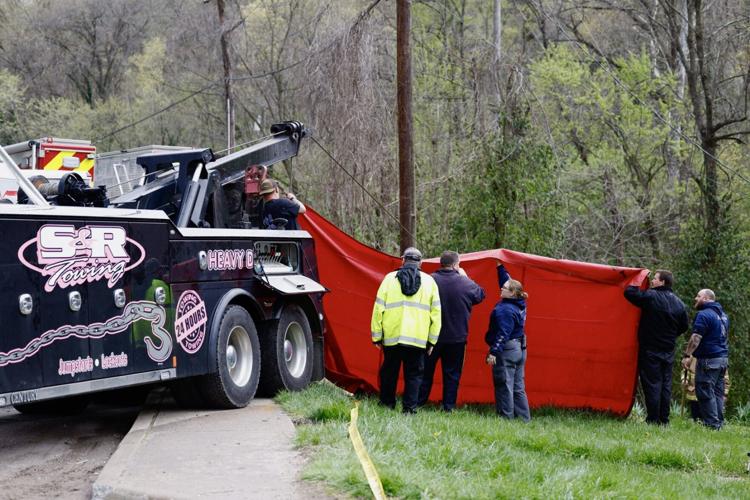 New Albany fire and police-car in the water 4-10-25