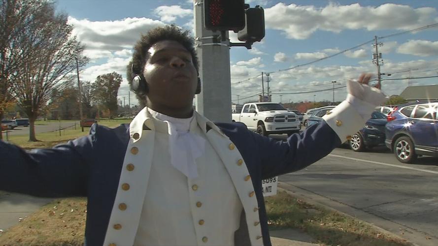 Performing 'Hamilton' hits, Male High School grad turns street into stage