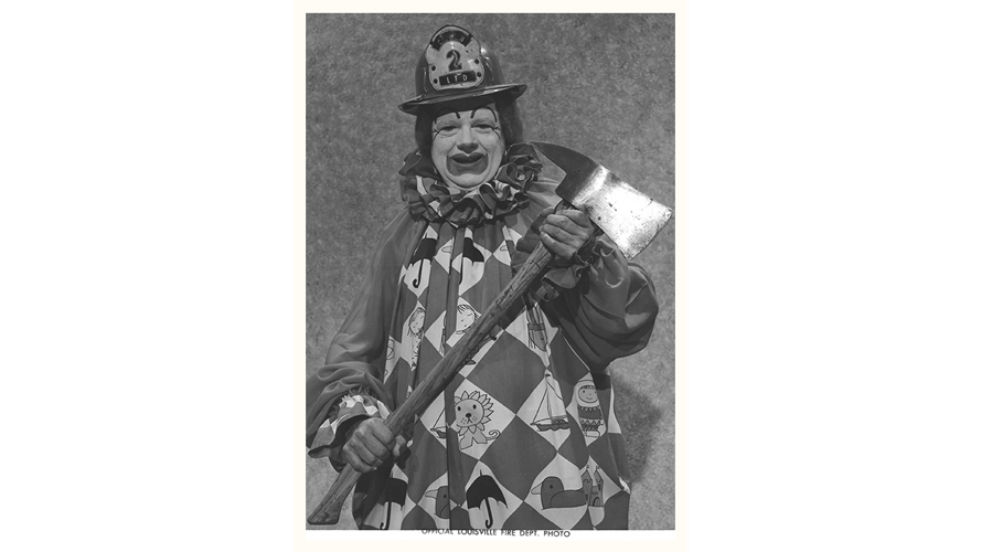 Presto the Magic Clown with fireman's axe
