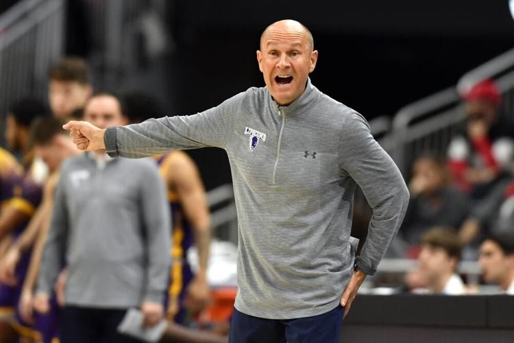 Lipscomb head coach Lennie Acuff shouts instructions.jpg