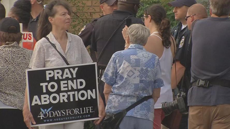 Crowd gathered outside EMW Women's Surgical Center on Market Street